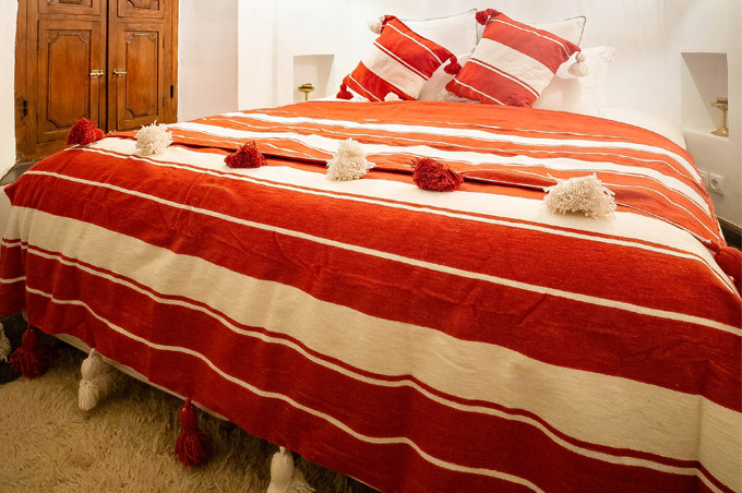 Red blanket with pom poms Moroccan Rugs Blankets